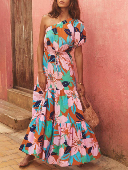 Robe fleurie style vacances à imprimé feuilles de palmier et épaules dénudées